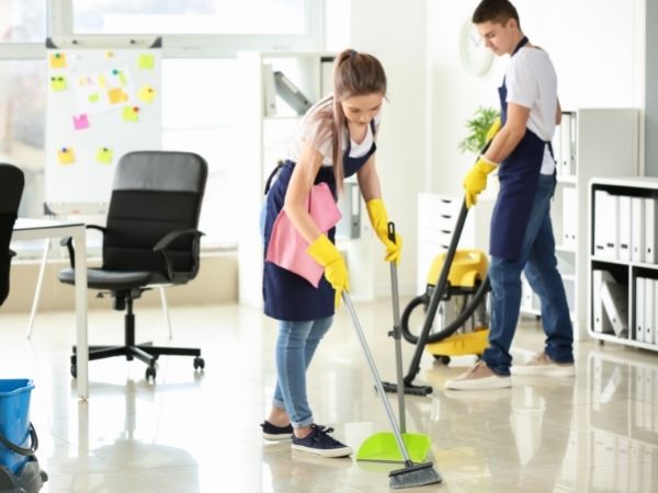 cleaners cleaning the office